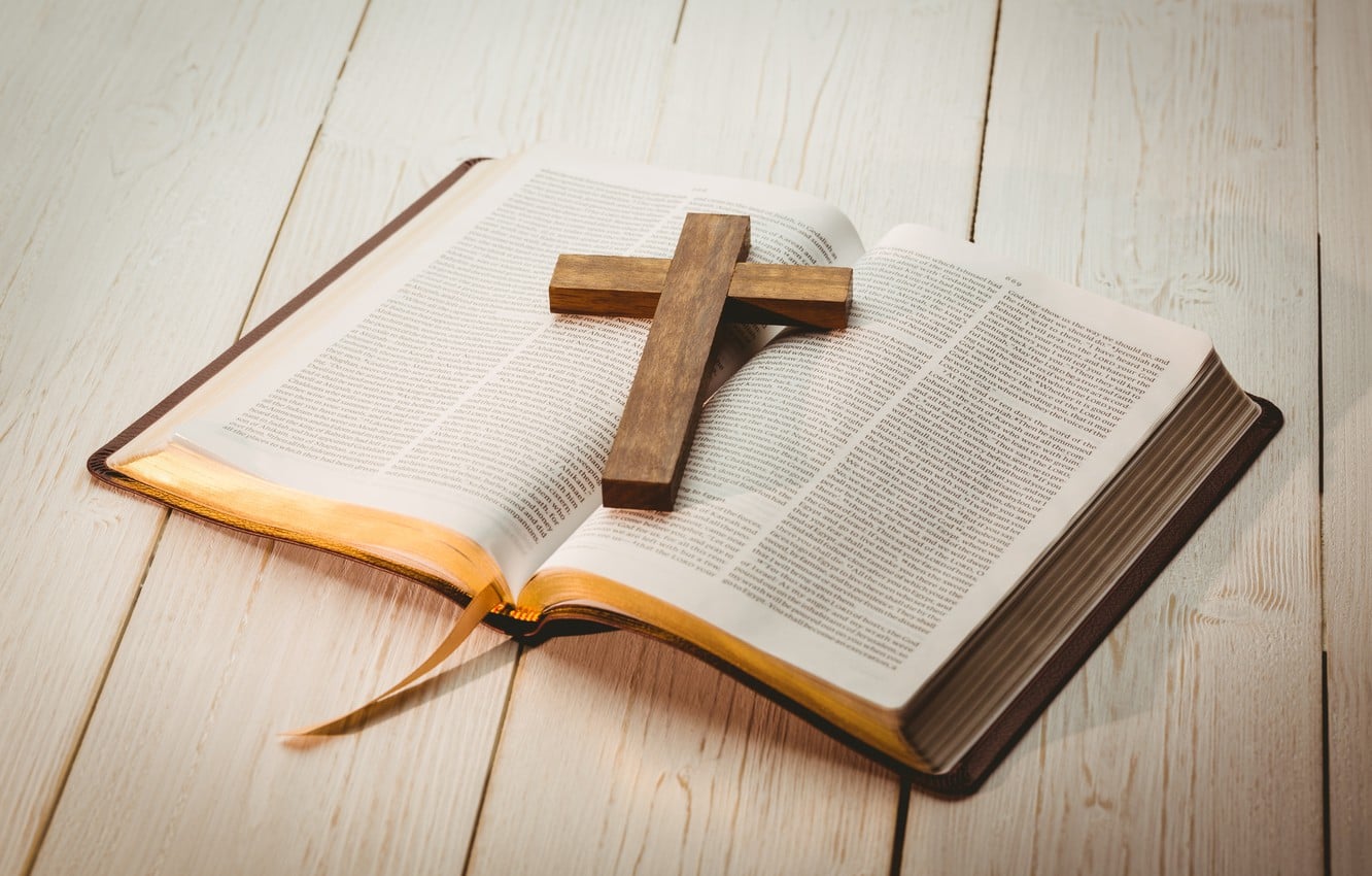 Bible with cross